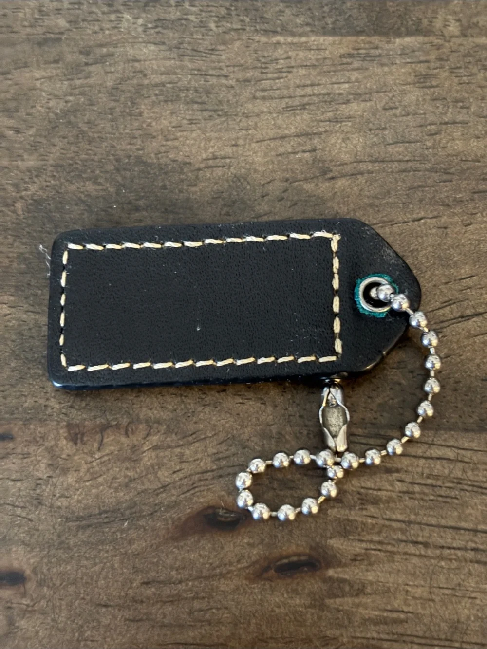 Coach sleek leather